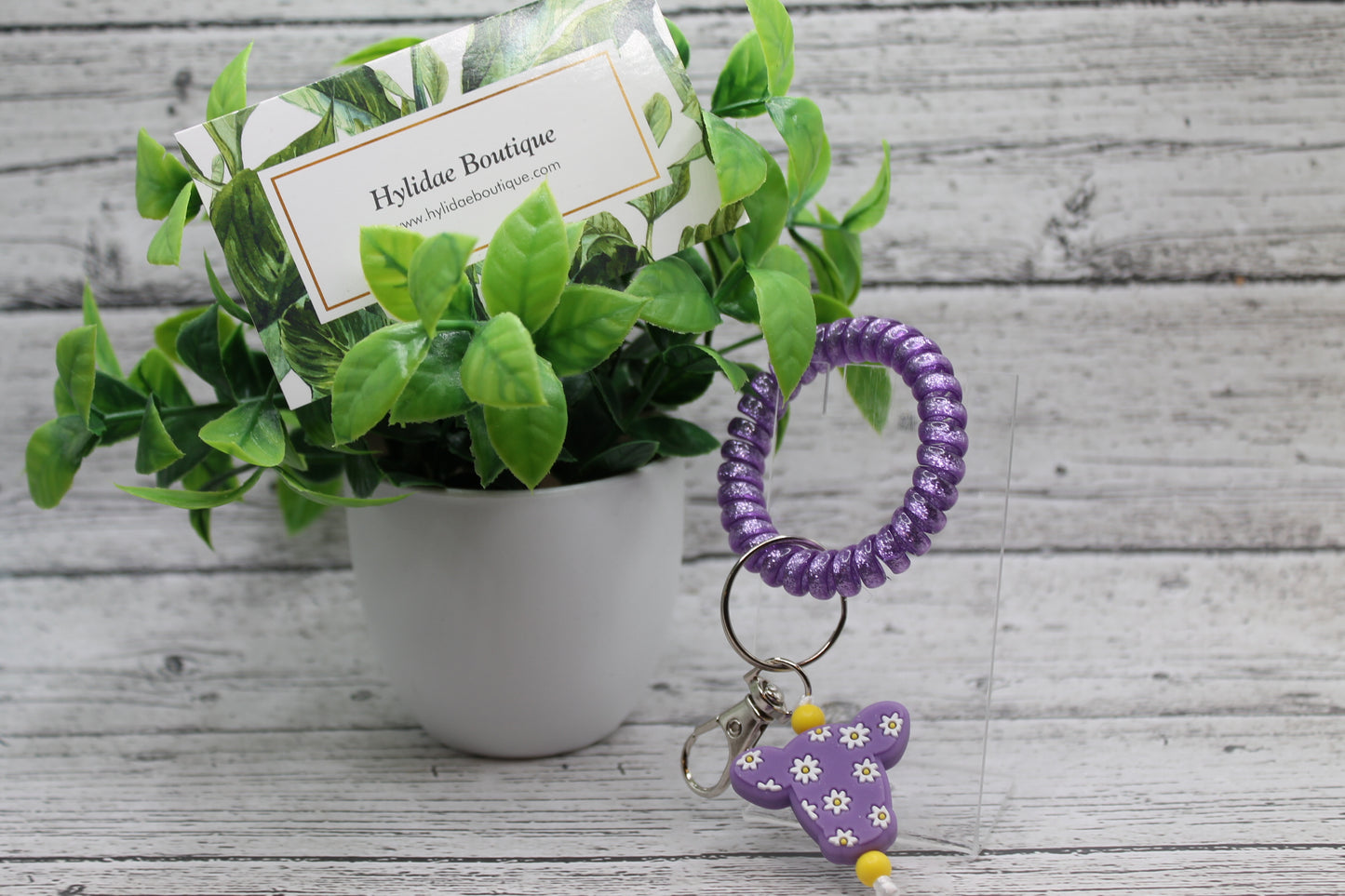 Purple Daisy Cow Sparkle Coil Wristlet Keychain