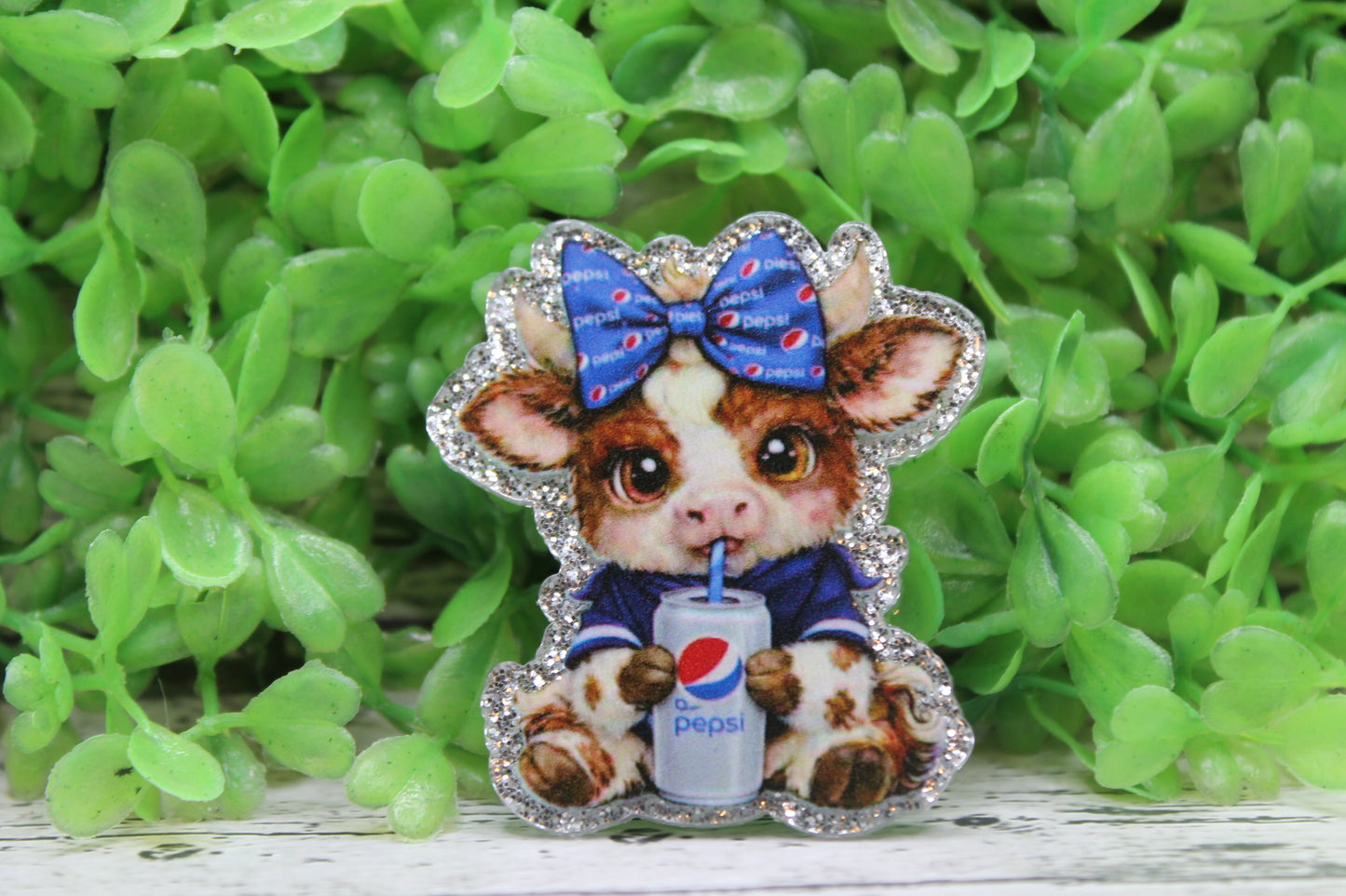 Blue Bow Cow with Dt Pepsi Badge Reel