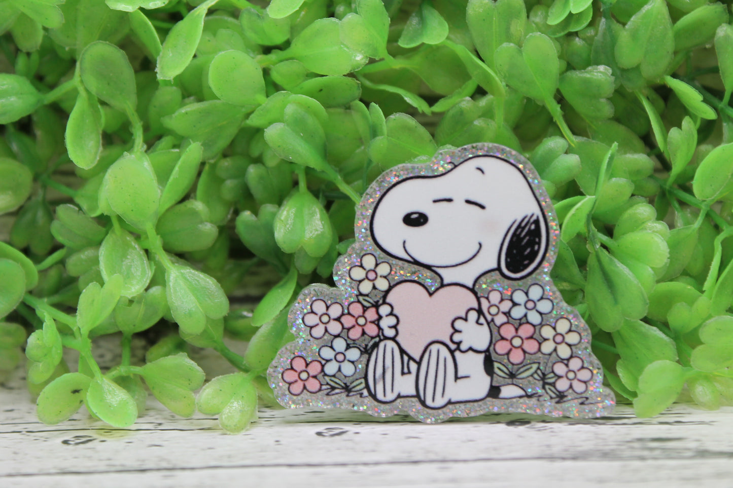White Dog Holding Heart in Flowers Badge Reel