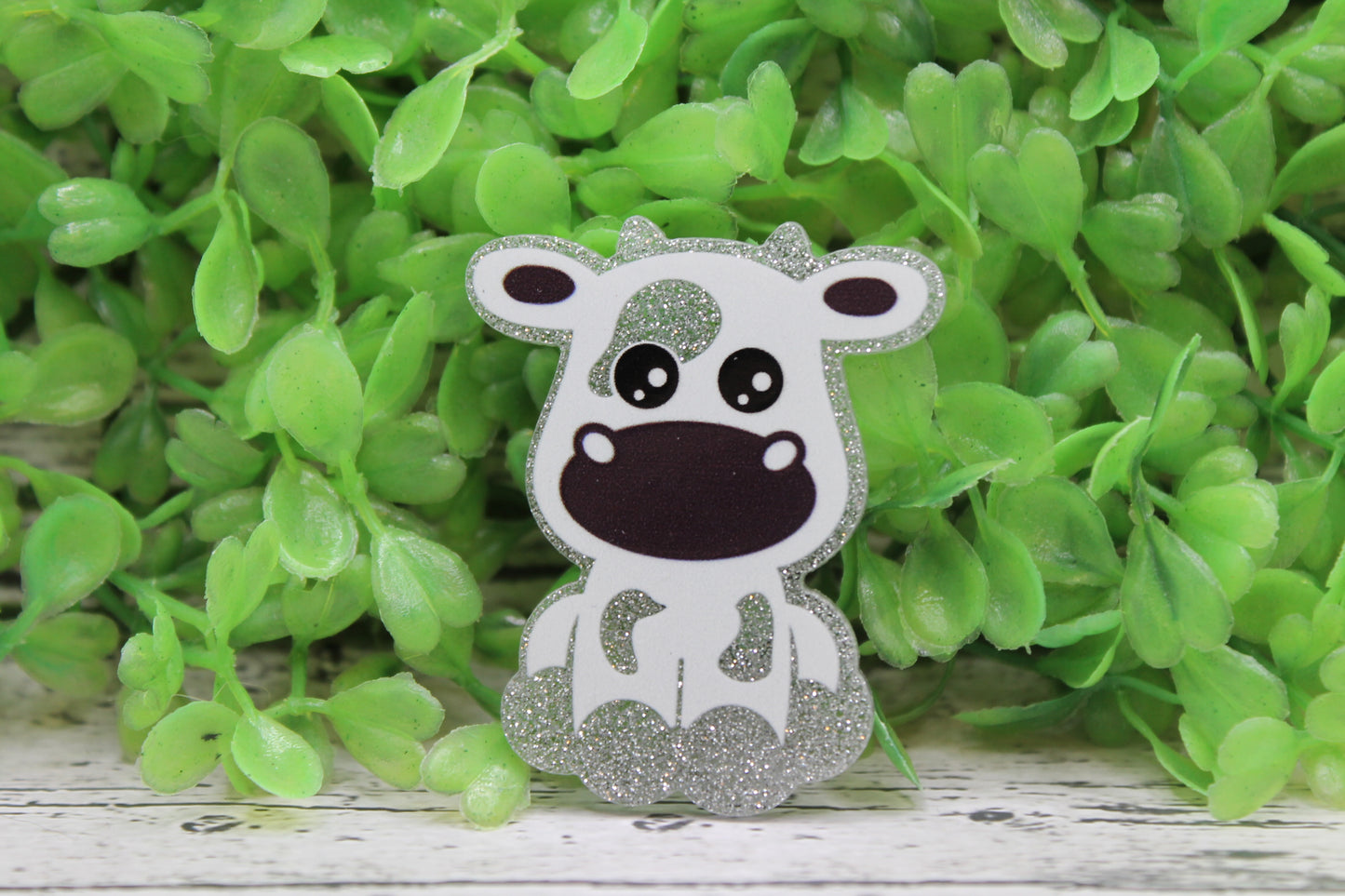 Cow on Silver Badge Reel