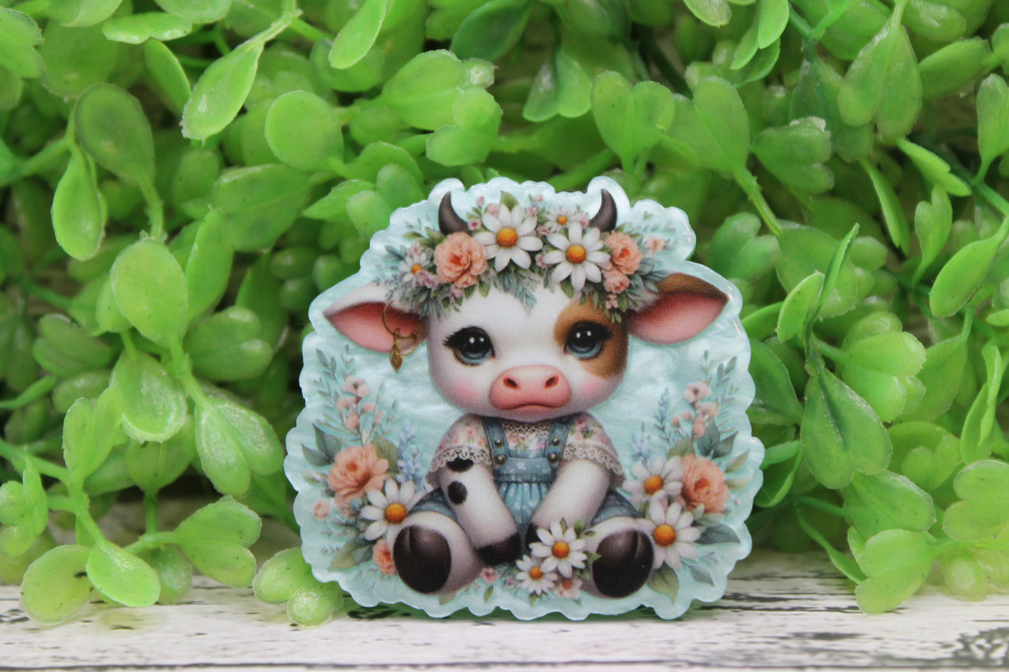 Floral Crown Cow on Light Blue Badge Reel