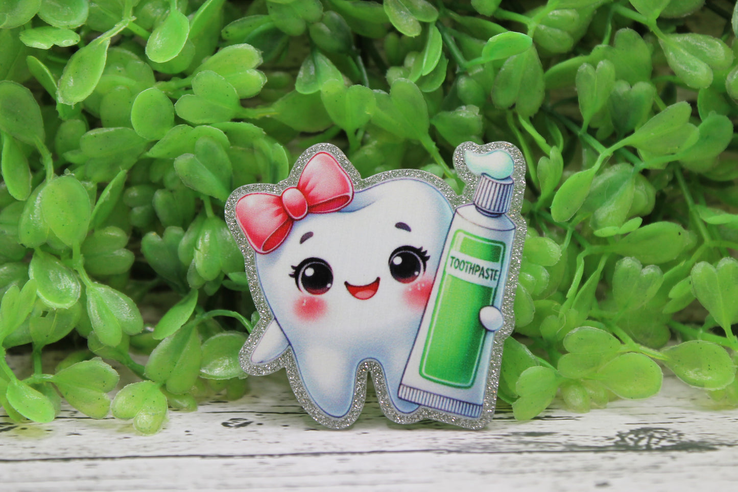 Tooth with Pink Bow and Tooth Paste Badge Reel