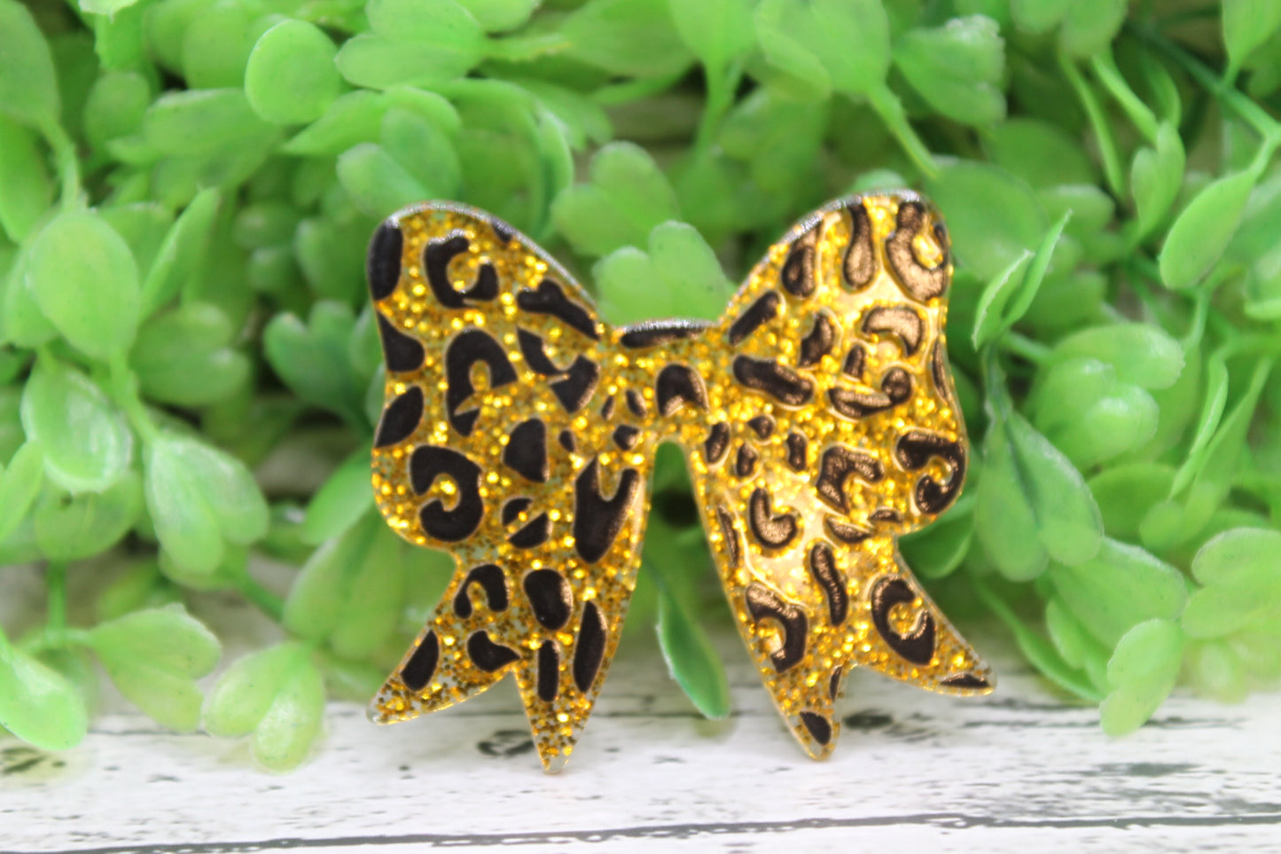 Gold Leopard Bow Badge Reel