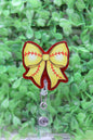 Softball Bow Badge Reel