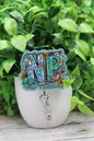 NP Nurse Practitioner on Blue Glitter Badge Reel