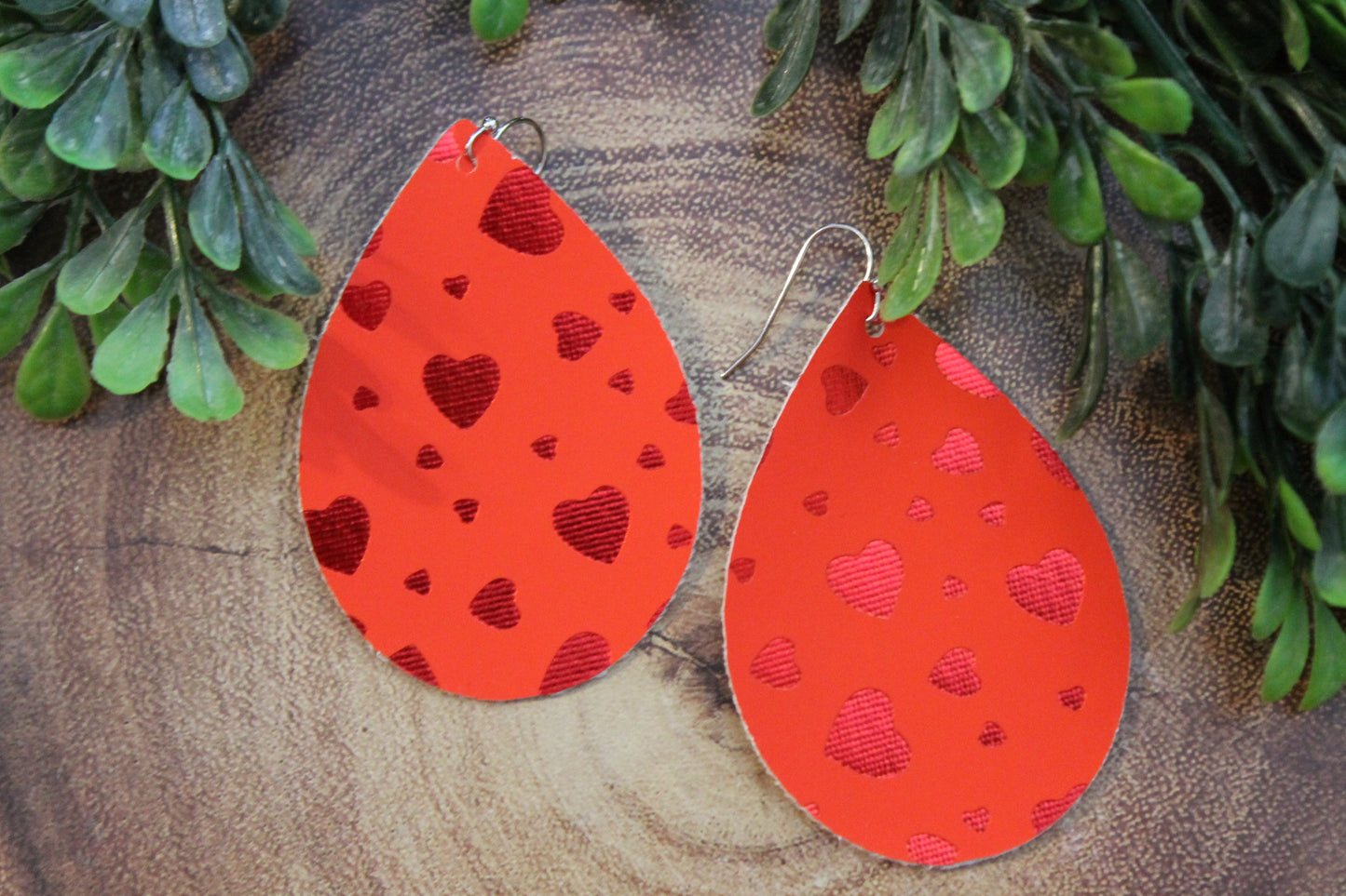 Red Metallic Hearts on Red • Single Sided Faux Leather Teardrop Dangle Earrings