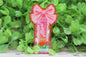 Alani with Pink Bow Badge Reel