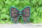 Turquoise and Tooled Leather Western Bow Badge Reel