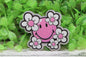 Purple Smiley with Flowers Badge Reel