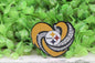 Steelers Football Swirl Heart Badge Reel