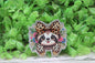 Sloth with Leopard Bow Badge Reel