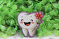 Tooth with Flower Badge Reel