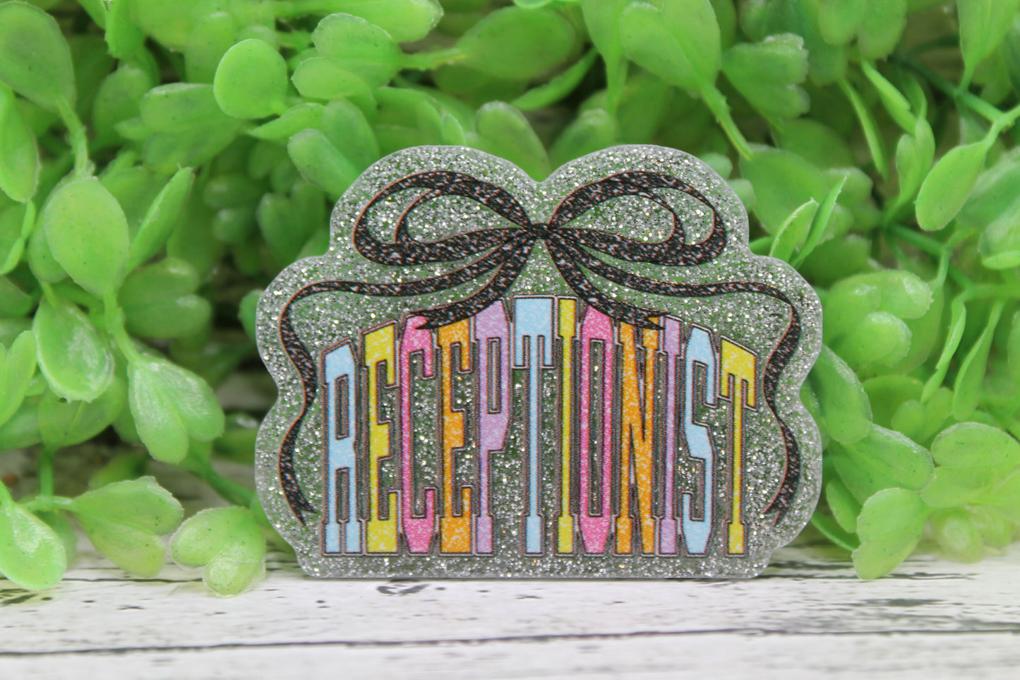 Receptionist with Bow Badge Reel