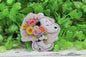 White Dog with Flower Bouquet Badge Reel