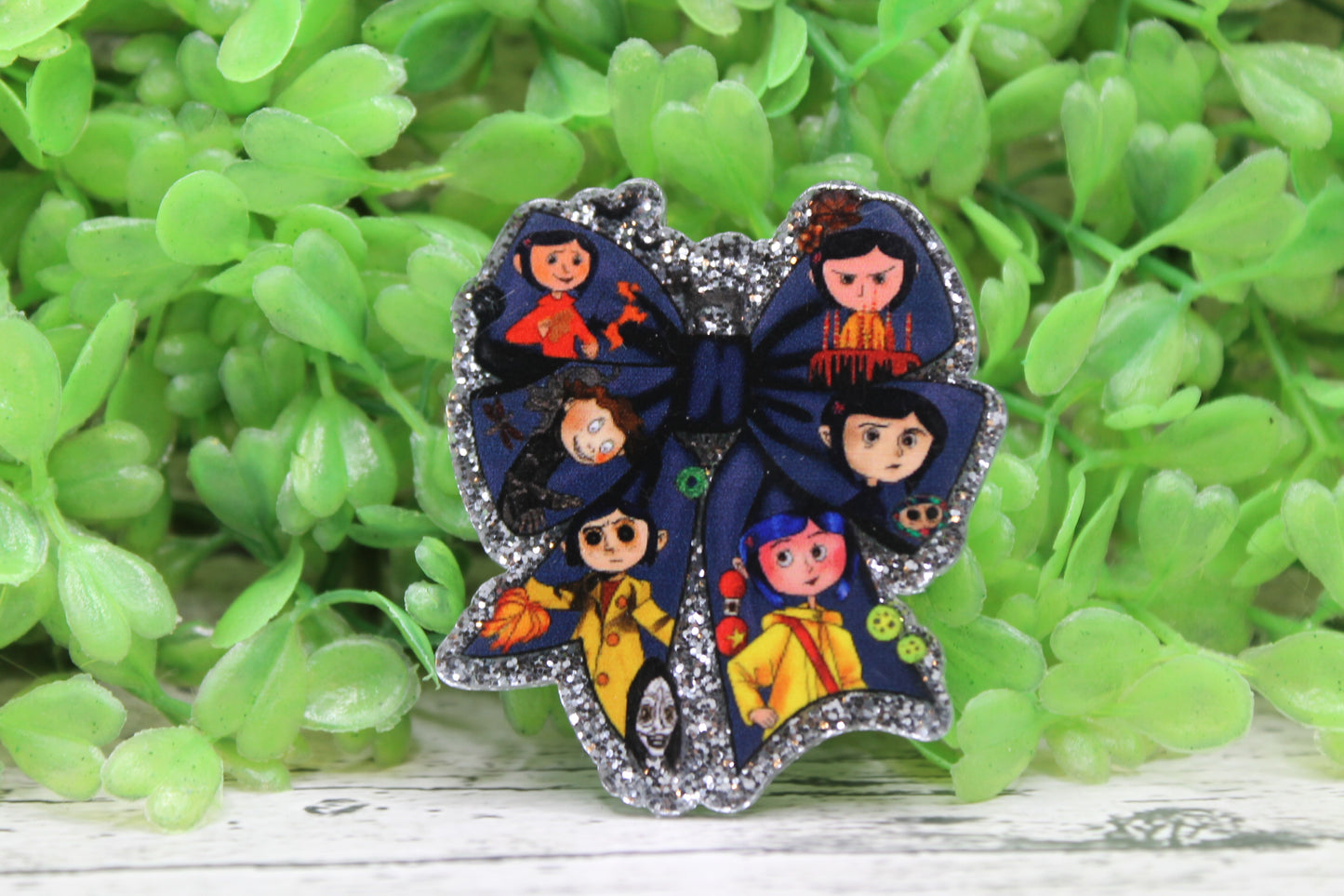 Coraline Bow Badge Reel