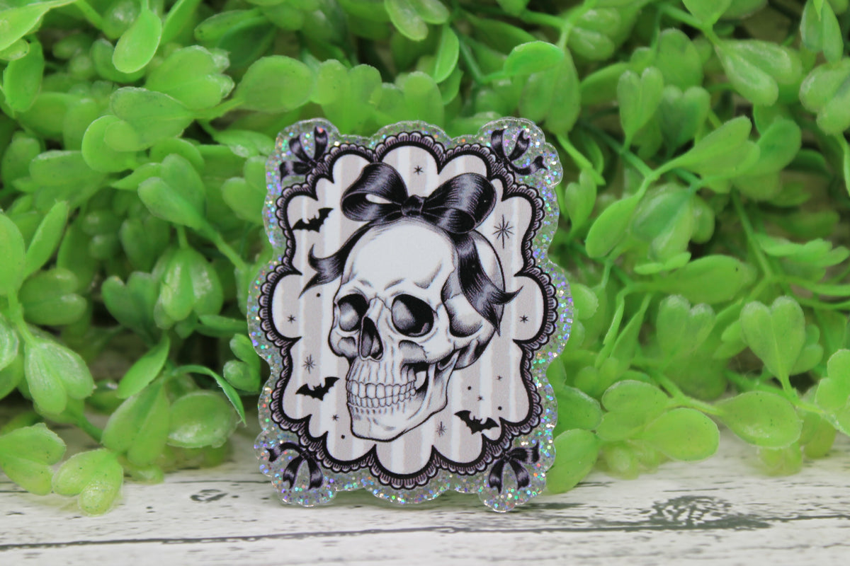 Skull with Bow Badge Reel