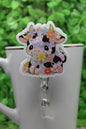 Floral Cow Shaker • Badge/ID Holder with Clip